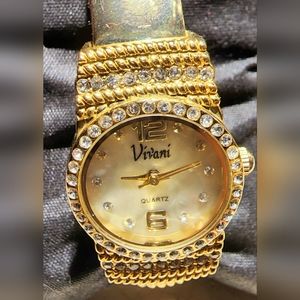 1980s Vivani gaudy gold with encrusted rhinestones bezel bangle wallet